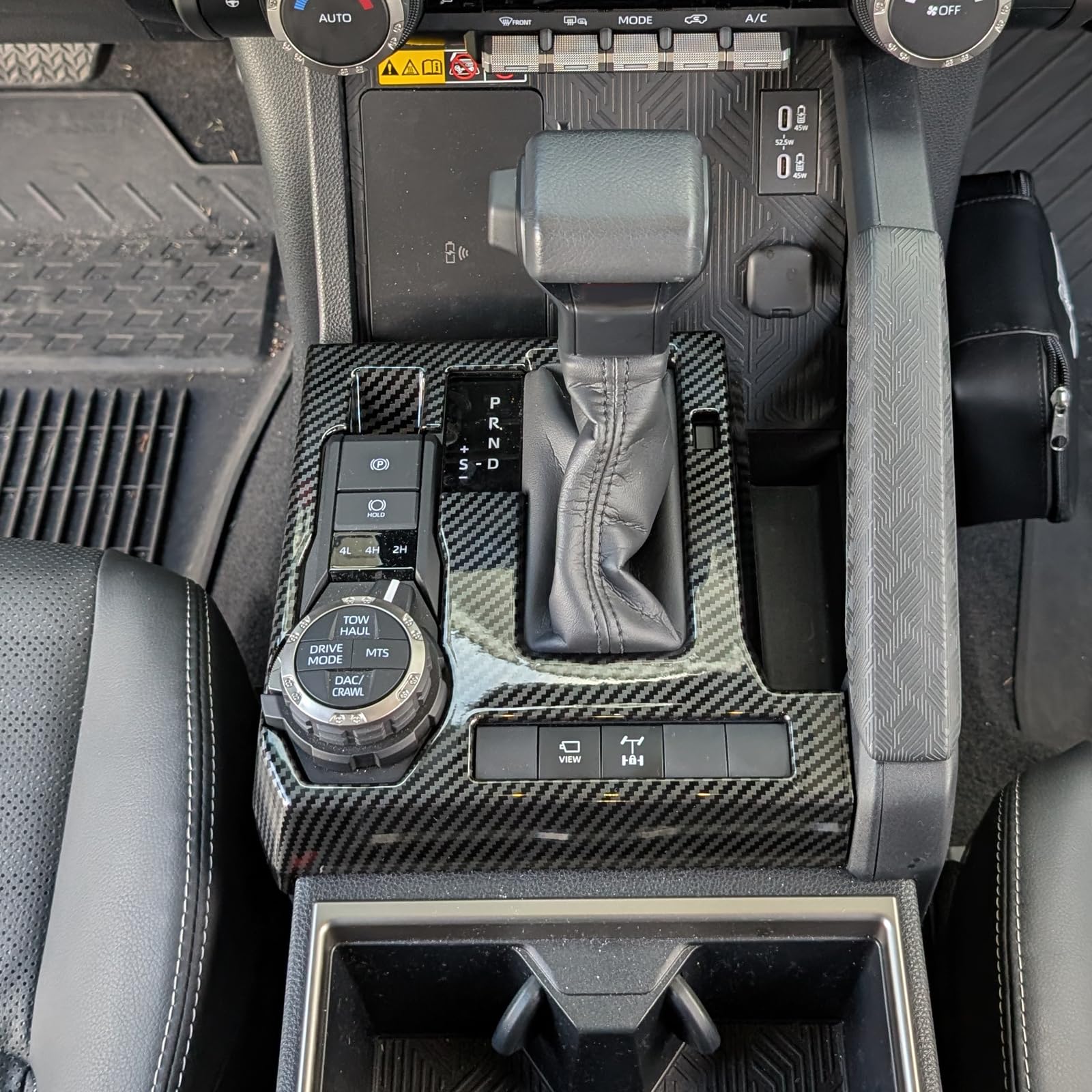 BORUIEN shift panel cover with carbon fiber grain for Tacoma interior protection.