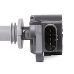 Bosch ignition coil under-hood wiring connection close-up.