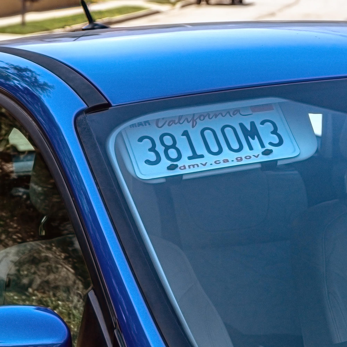 BrainExploder sun visor license plate mount front view for a clean, clutter-free look.