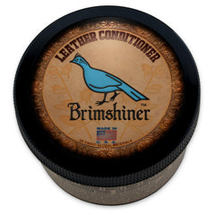 Brimshiner Leather Conditioner bottle pour shows easy application and surface protection.