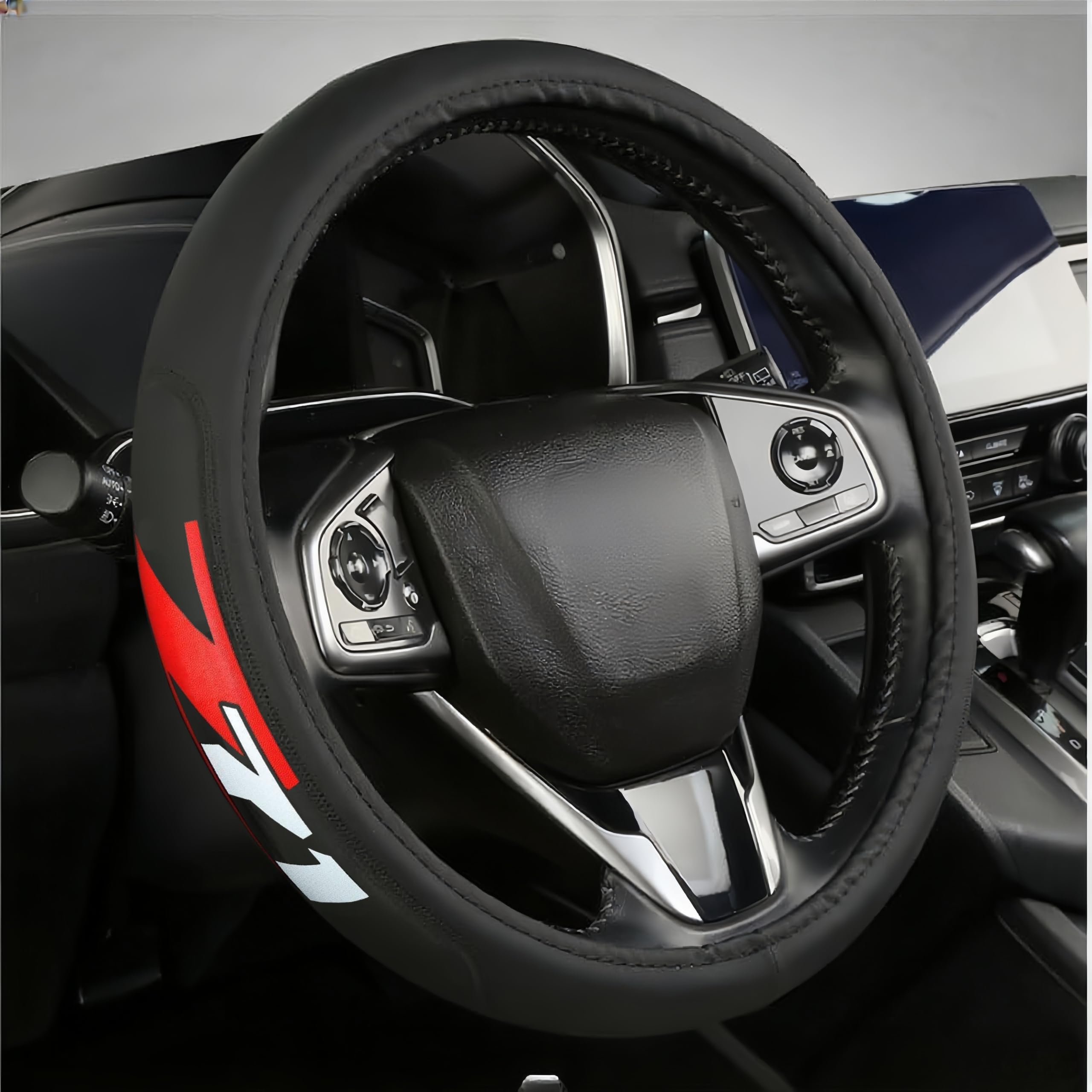BUGUANGJIAN Z71 steering cover with logo embroidery adds personalized style and grip.