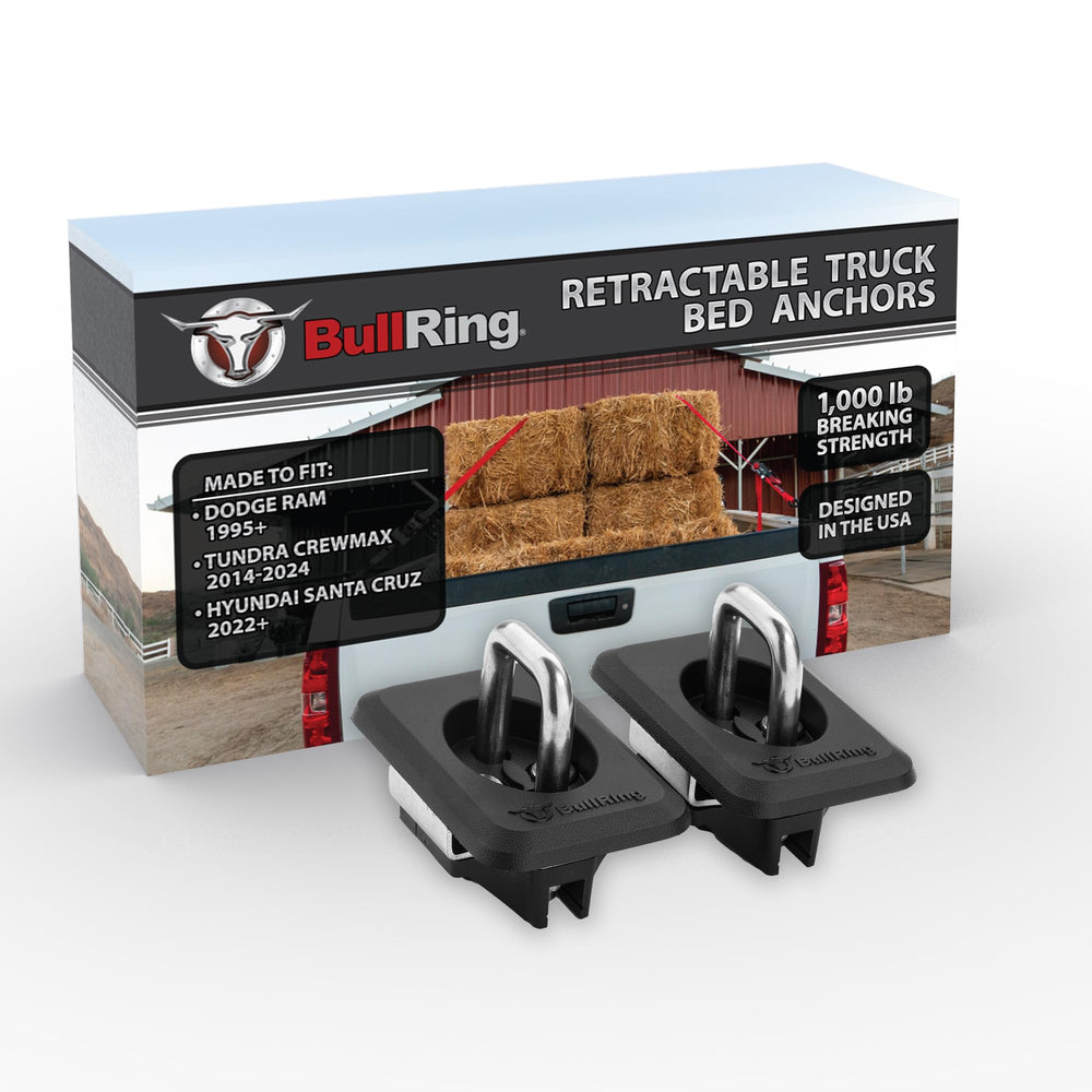 Bull Ring retractable anchors on a Dodge Ram bed for secure cargo.
