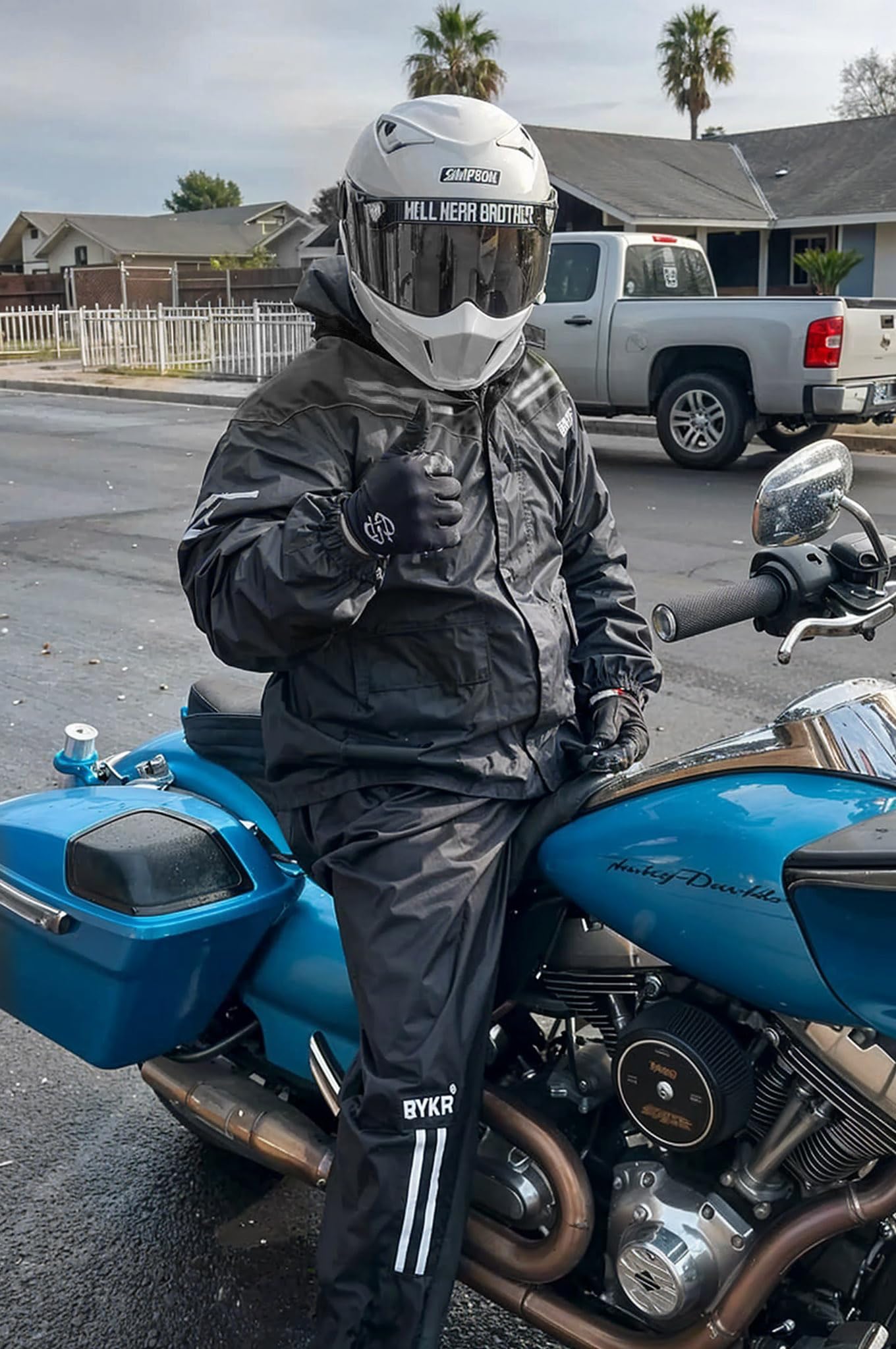 BYKR rain suit adjustable cuffs and hood for tailored fit