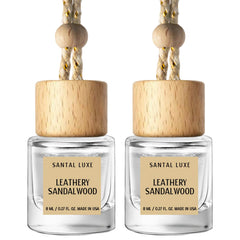 C Classy hanging car air freshener with leathery sandalwood notes enhances cabin fragrance.