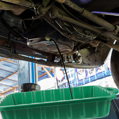 CALLARON pan used as parts cleaning tray in a workshop.