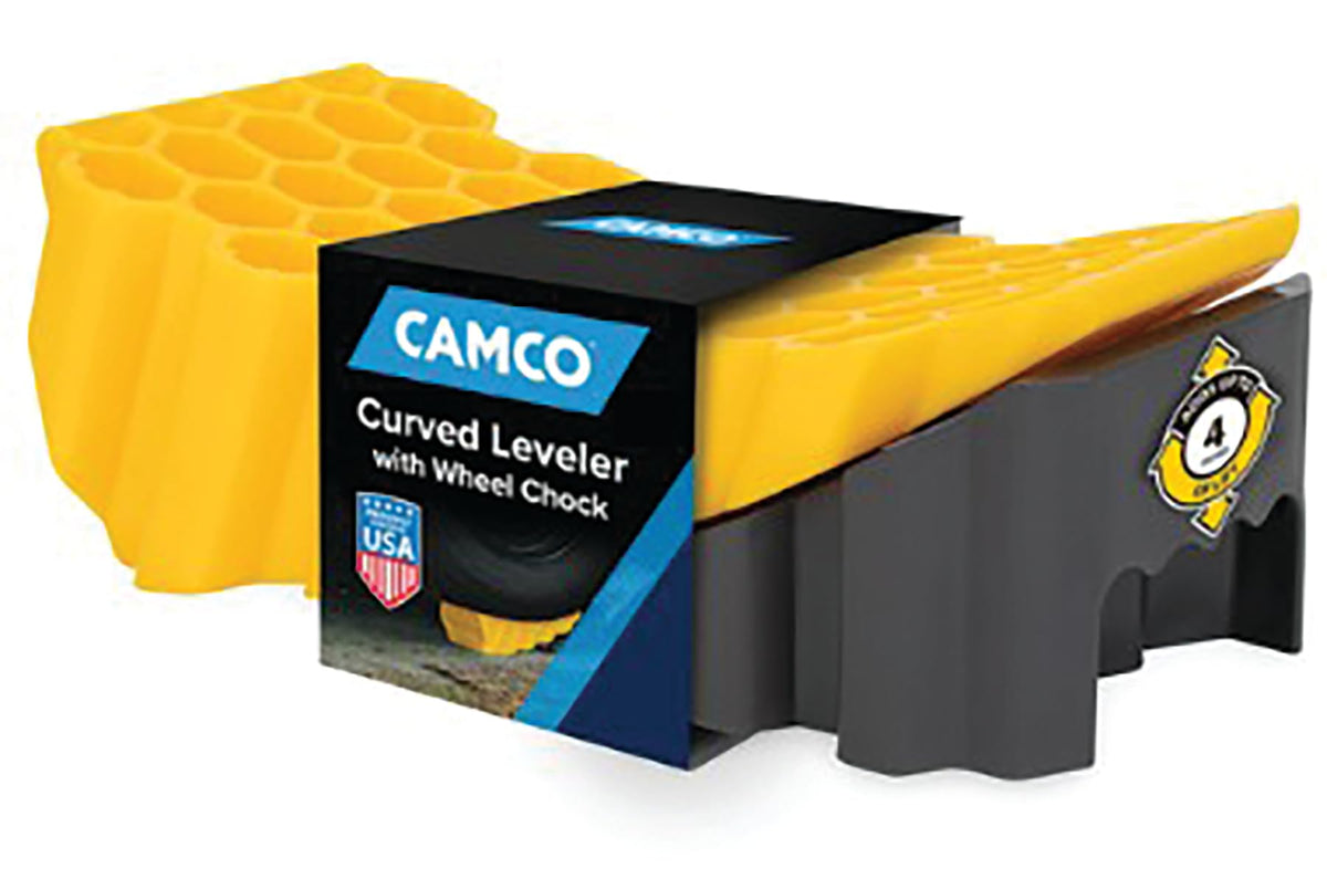 Camco Curved Leveler drive-on in use for quick trailer leveling.