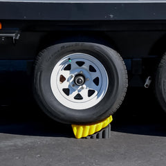 Camco curved leveler lifts up to four inches for stable RV leveling.