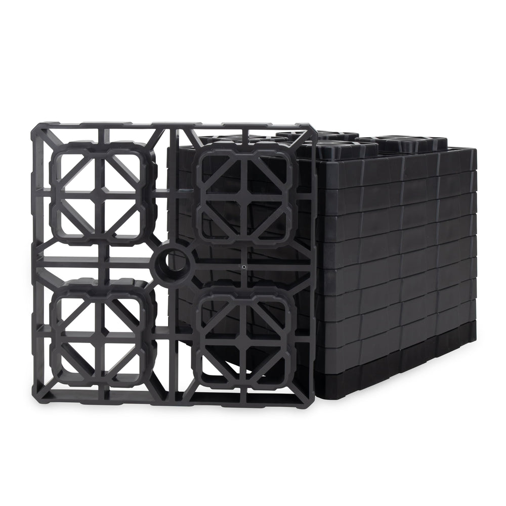 Camco FasTen XL leveling blocks with interlock design for stable RV leveling.