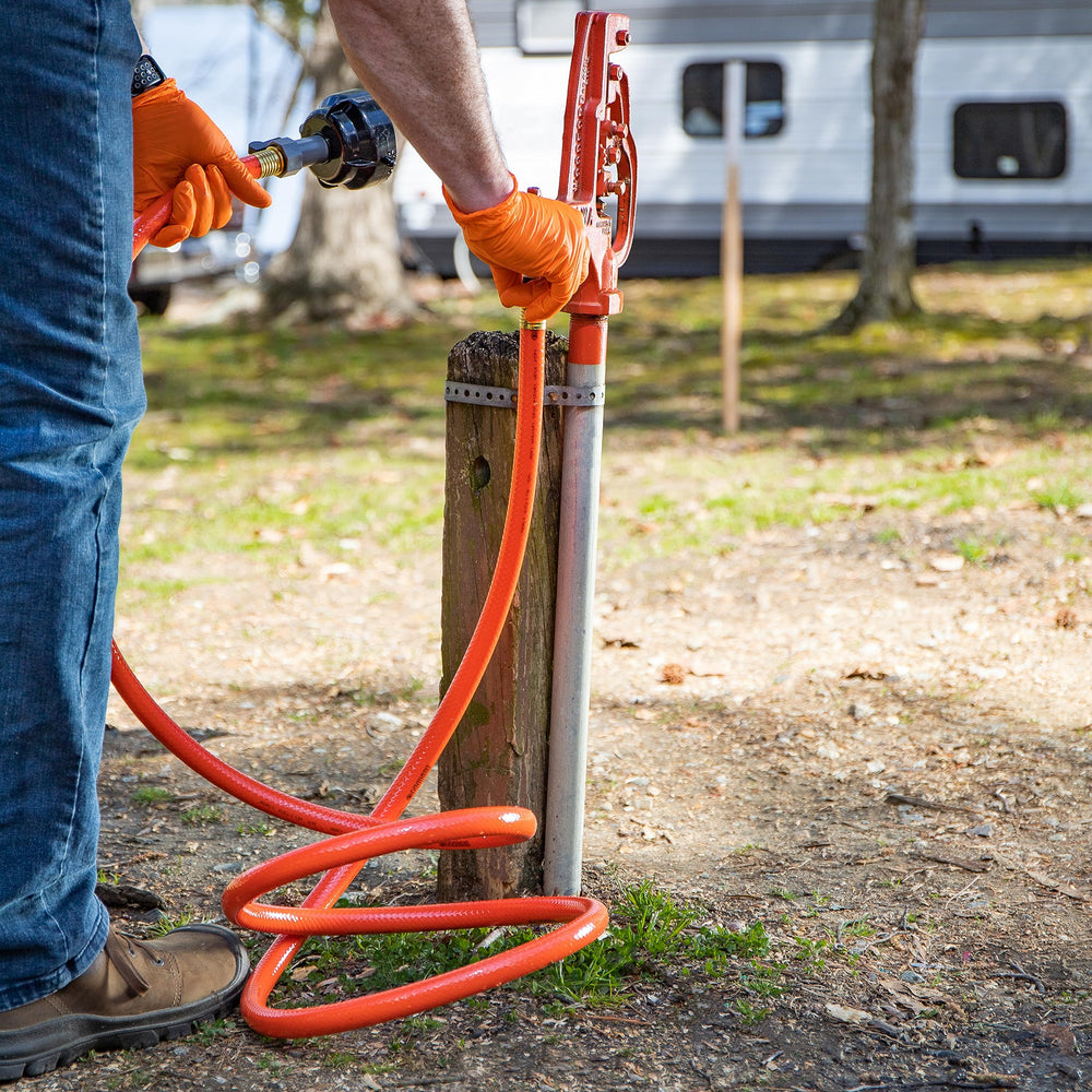 Camco Rinser Cap on 3-inch bayonet fitting for leak-free rinse.