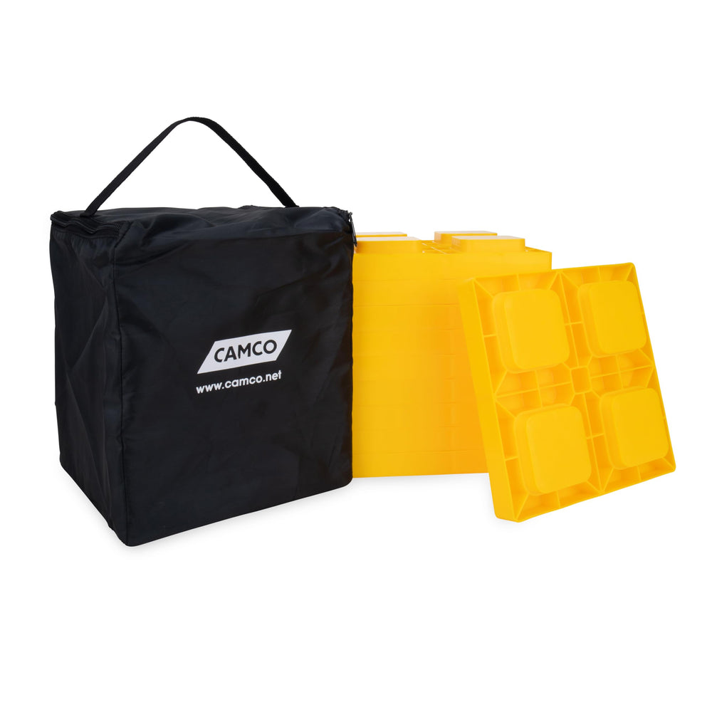 Camco RV leveling blocks demonstrate interlocking design for customizable height.