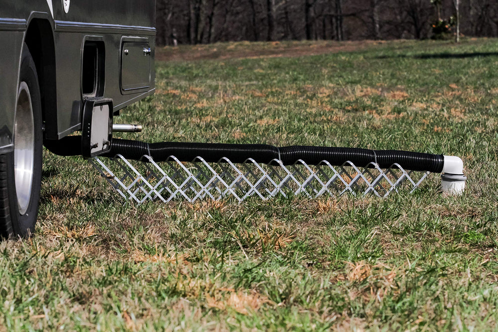 Camco bayonet straight hose adapter shown for fast, secure connections.