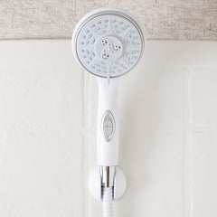 Camco RV shower head on/off switch close-up shows pause control.