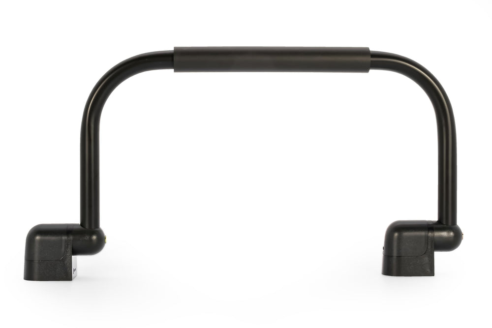 Camco small fold-away grab handle in use on a compact RV.