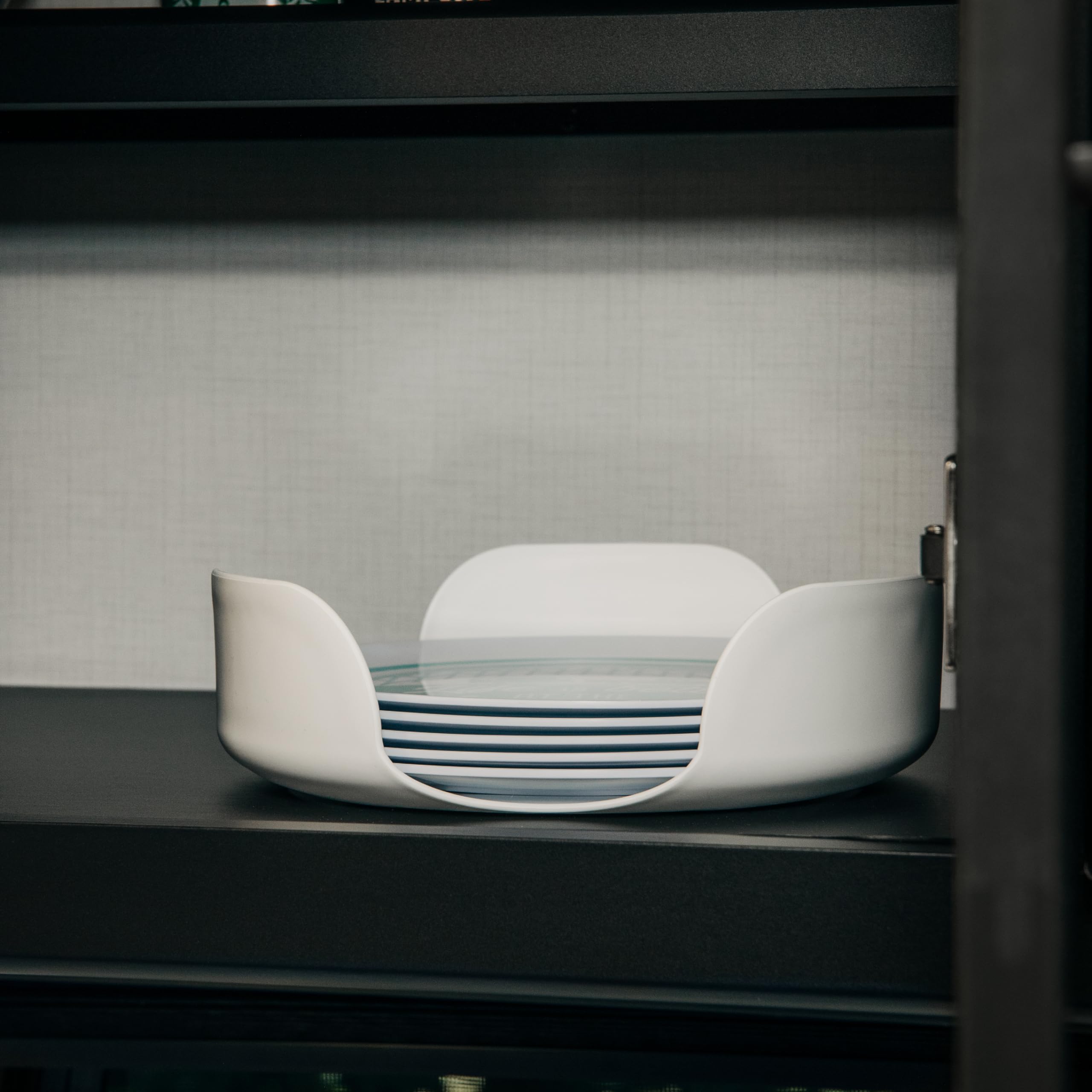 Camco Stack-A-Plate storage setup ideal for RVs, boats, and home use