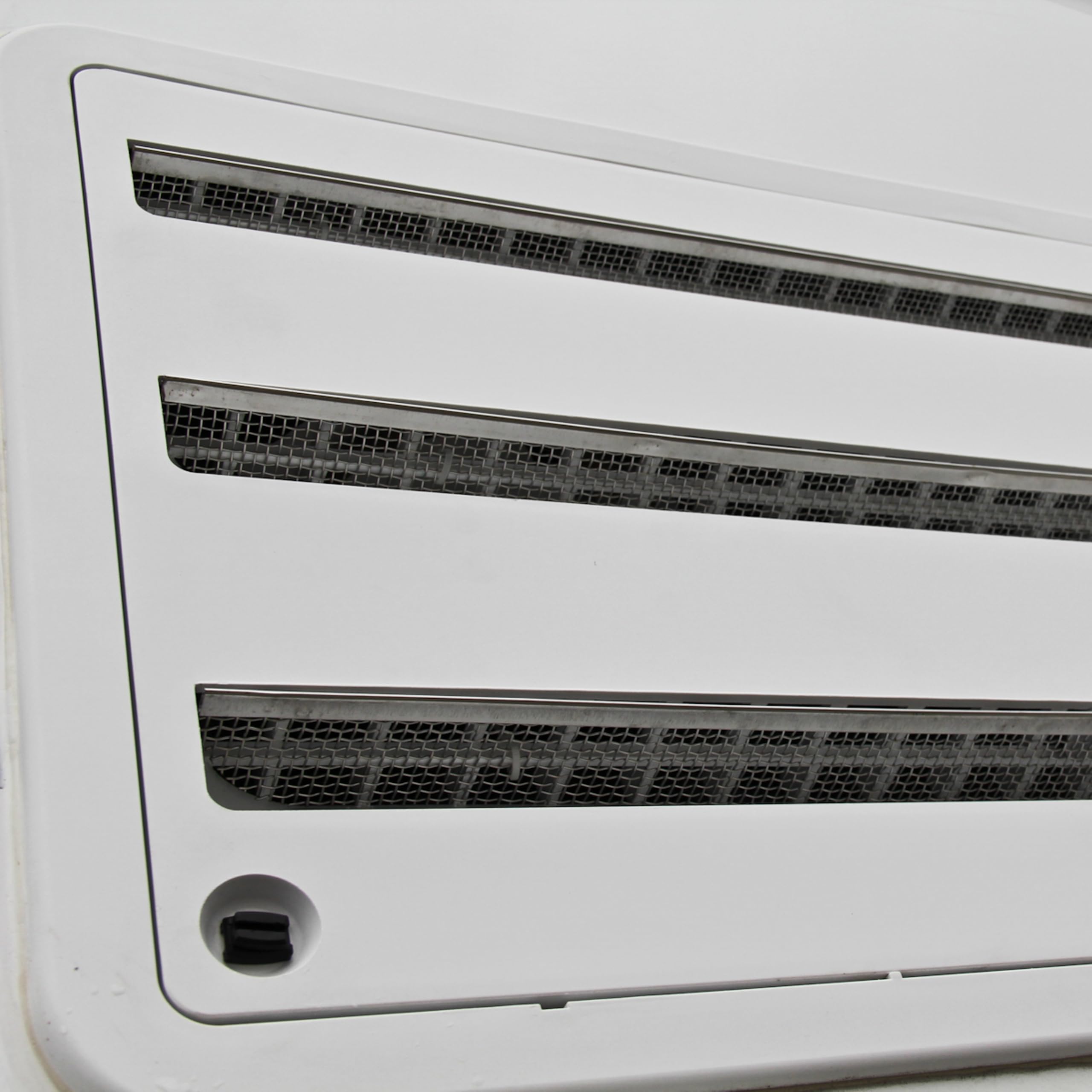 Stainless steel mesh resists weather while preserving ventilation.