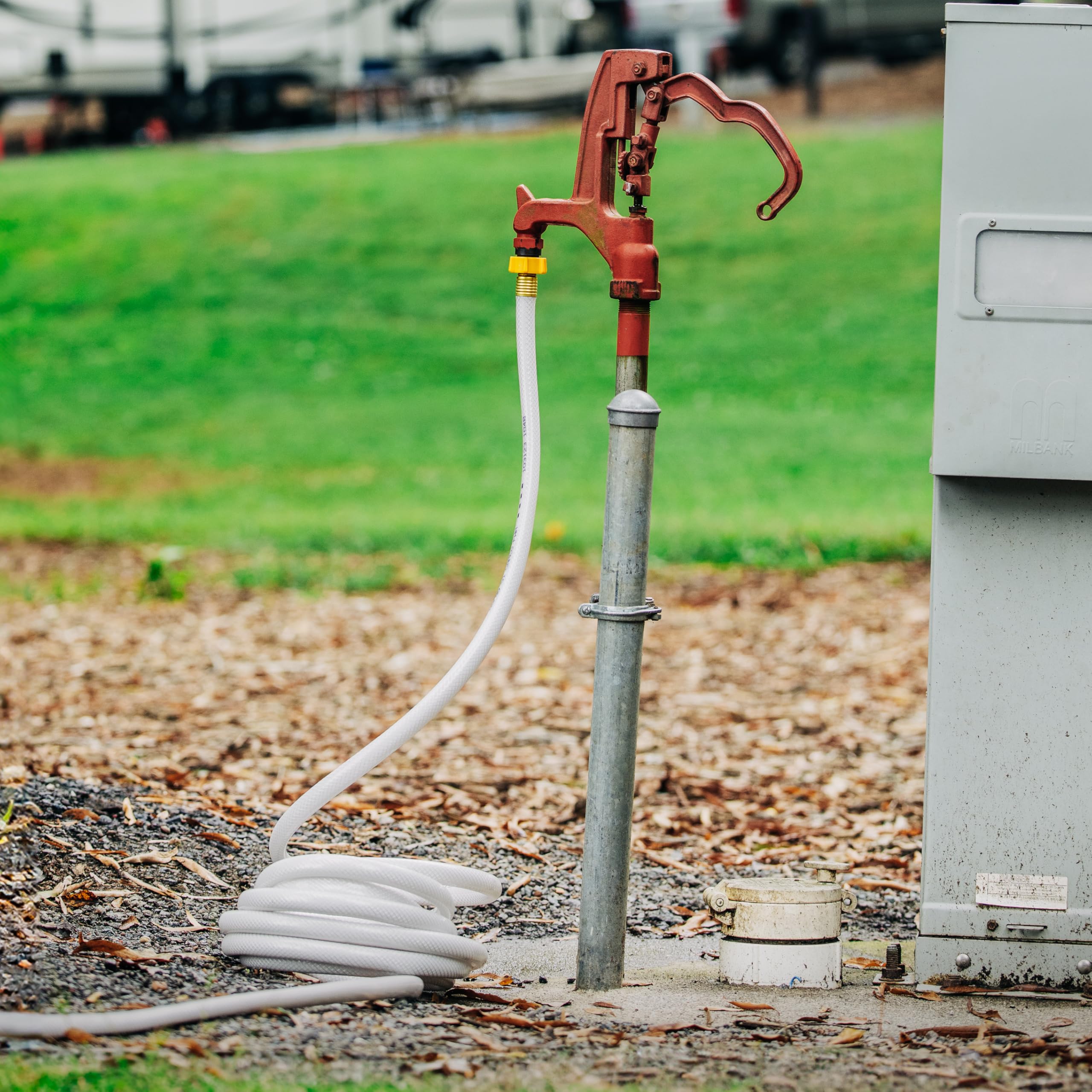 Camco TastePURE 50-foot hose in use for RV water supply.