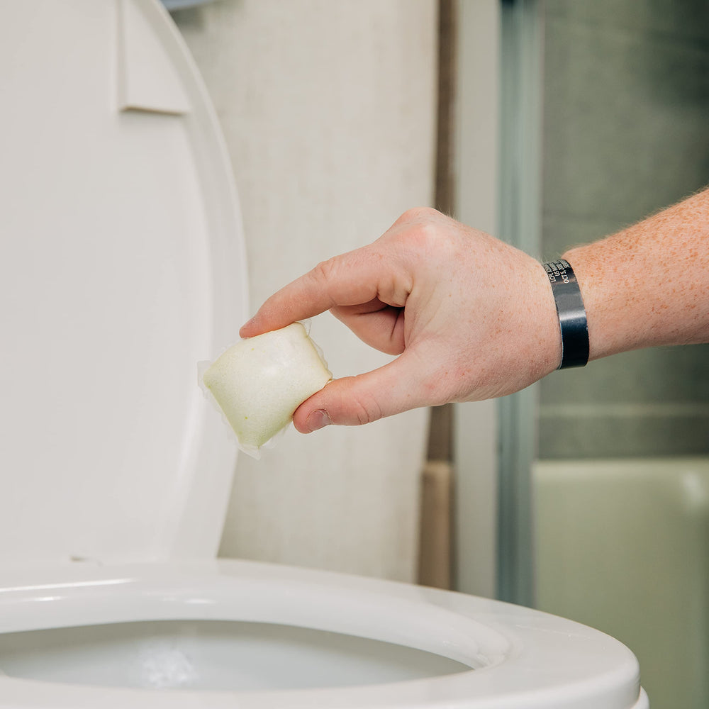 Camco TST RV toilet drop-in in use improving tank hygiene on trips