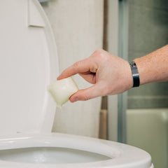 Camco TST RV toilet drop-in in use improving tank hygiene on trips