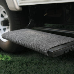 Camco step rug installation side view shows no tools required for easy setup.
