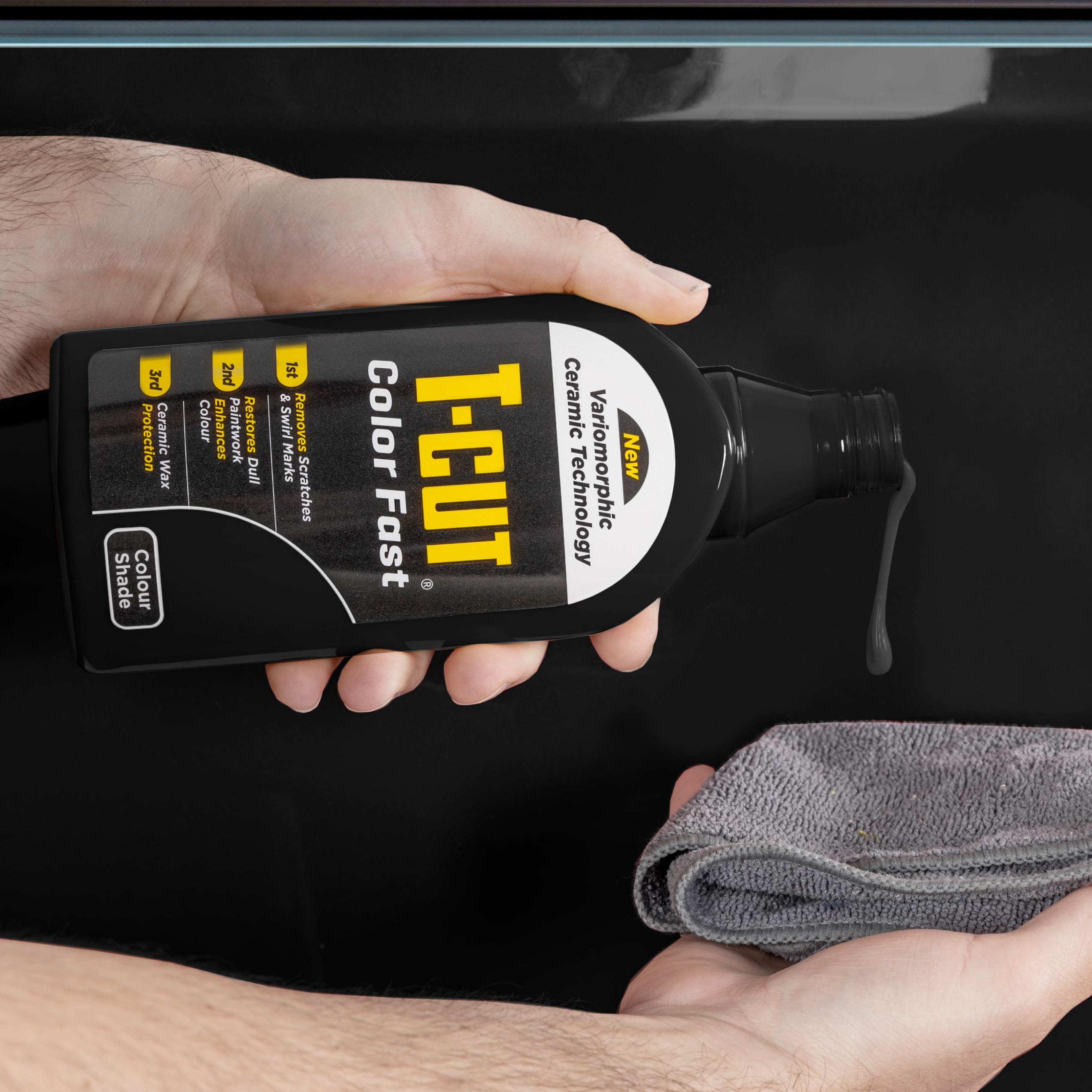 Applying Car Gods T-Cut Color Fast Black with a foam pad for smooth, even coverage.