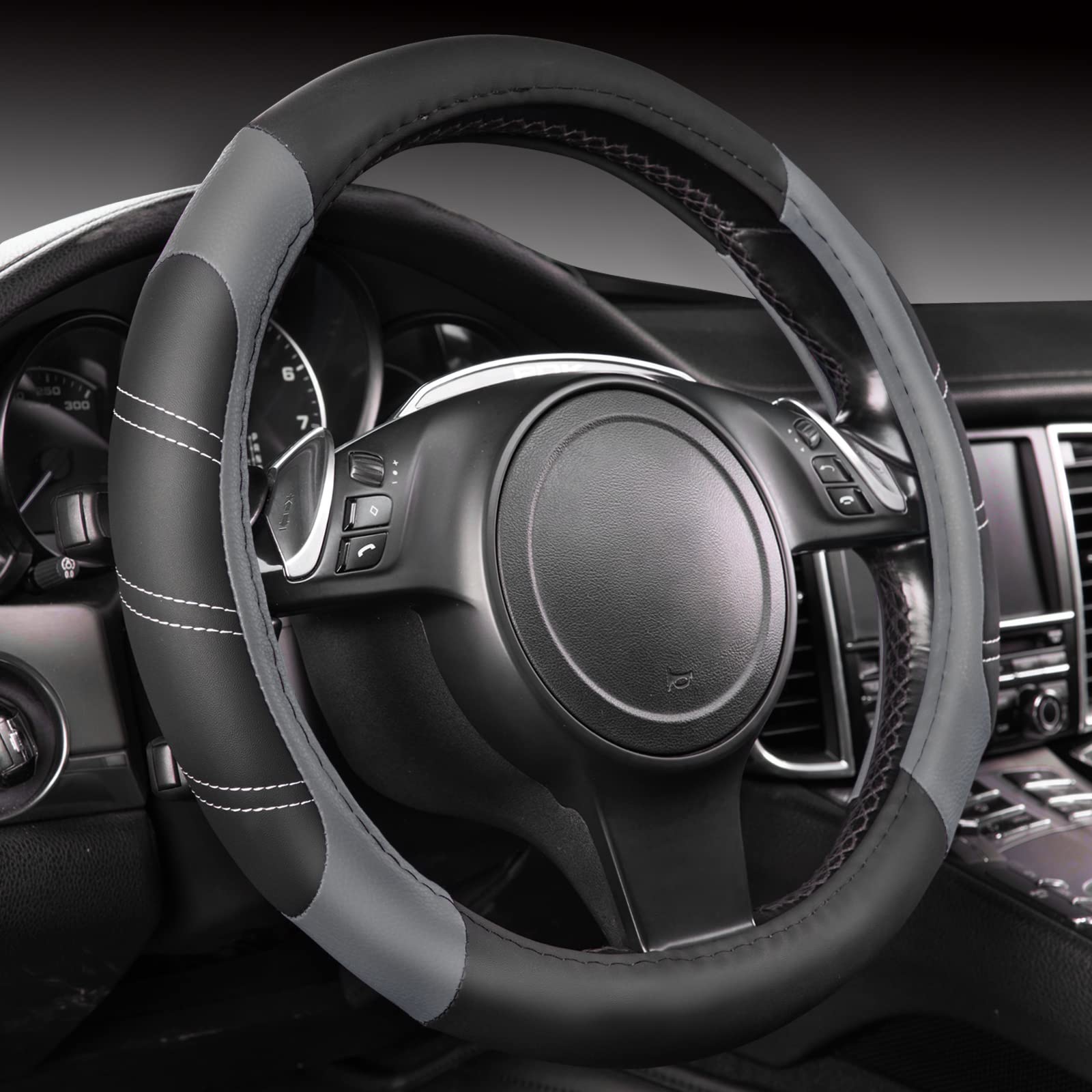 CAR PASS Line Rider soft-touch steering cover on a 14.5–15 inch wheel for comfortable grip.