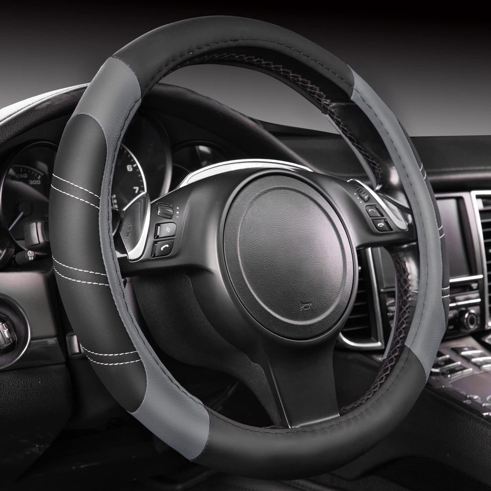 CAR PASS Line Rider soft-touch steering cover on a 14.5–15 inch wheel for comfortable grip.
