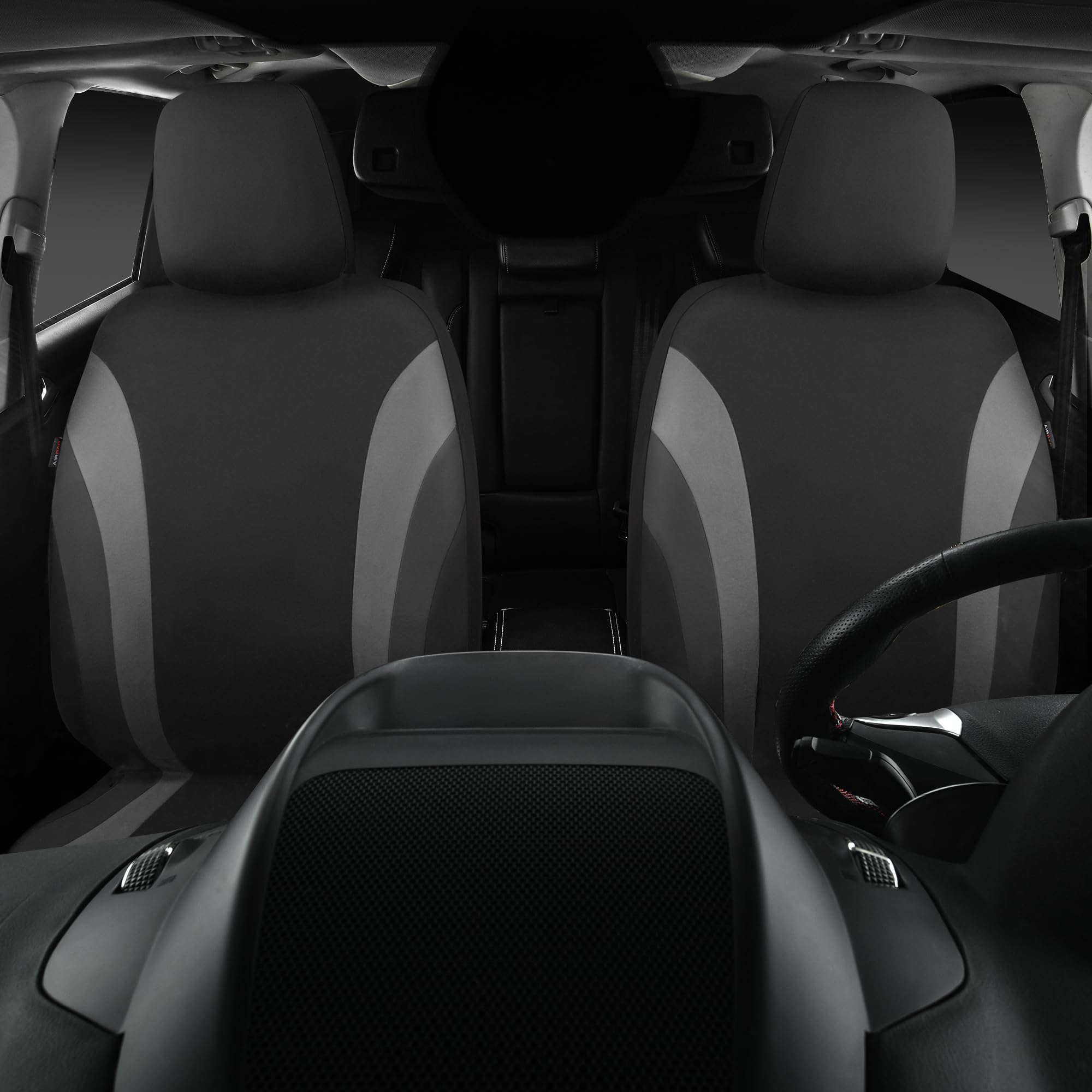 CAR PASS Line Rider Sporty universal-fit front seat covers on a sedan interior.