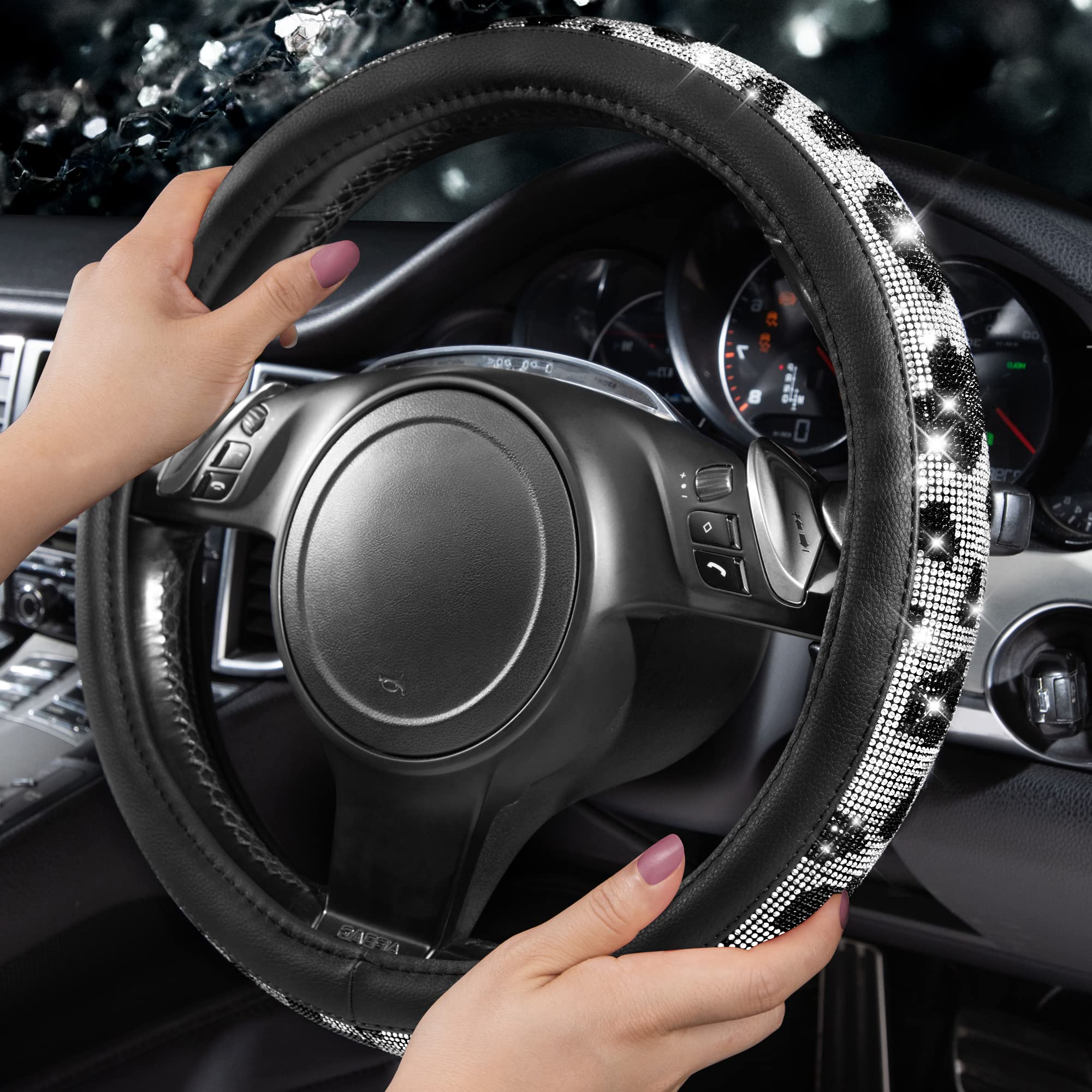 Shiny rhinestones on CAR PASS steering wheel cover sparkle in sunlight.