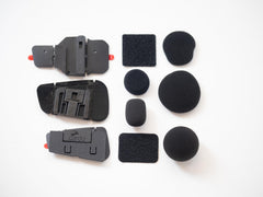 Close-up of Cardo speaker sponges and Velcro pieces demonstrating fit and cushioning benefits for clearer audio
