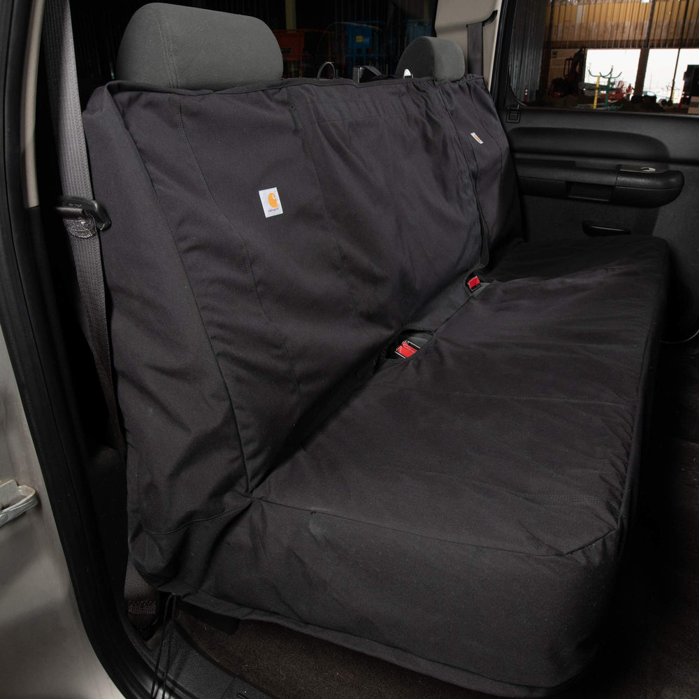 Carhartt bench seat cover headrest-access design keeps built-in features reachable.