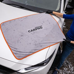 CARPRO DHydrate grey towel with visible dirt highlights surface cleanliness