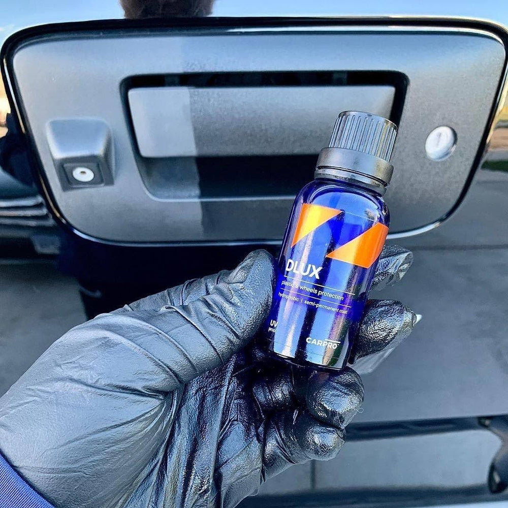 Production date printed on CARPRO DLUX bottle.