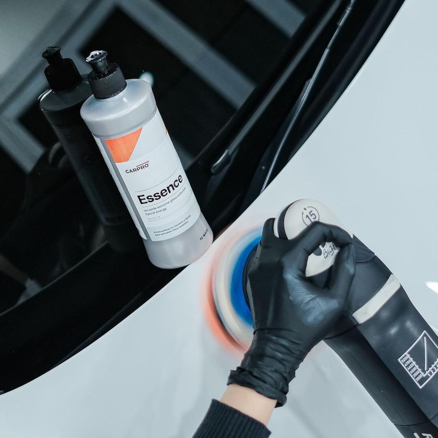 CARPRO Essence SiO2-protection layer on paint suggests durable gloss shield