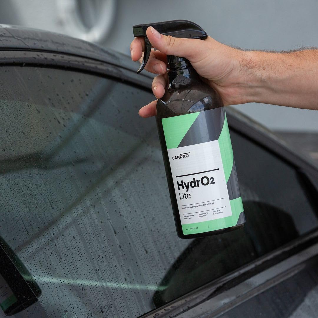 CARPRO HydrO2 Lite water-bead close-up shows hydrophobic beading after treatment.