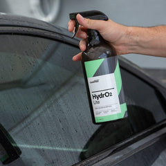 CARPRO HydrO2 Lite water-bead close-up shows hydrophobic beading after treatment.