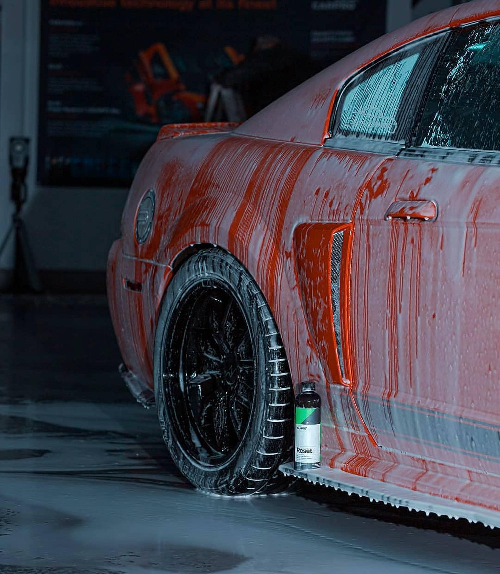 CARPRO Reset fresh-scent bottle signaling a pleasant car wash experience.