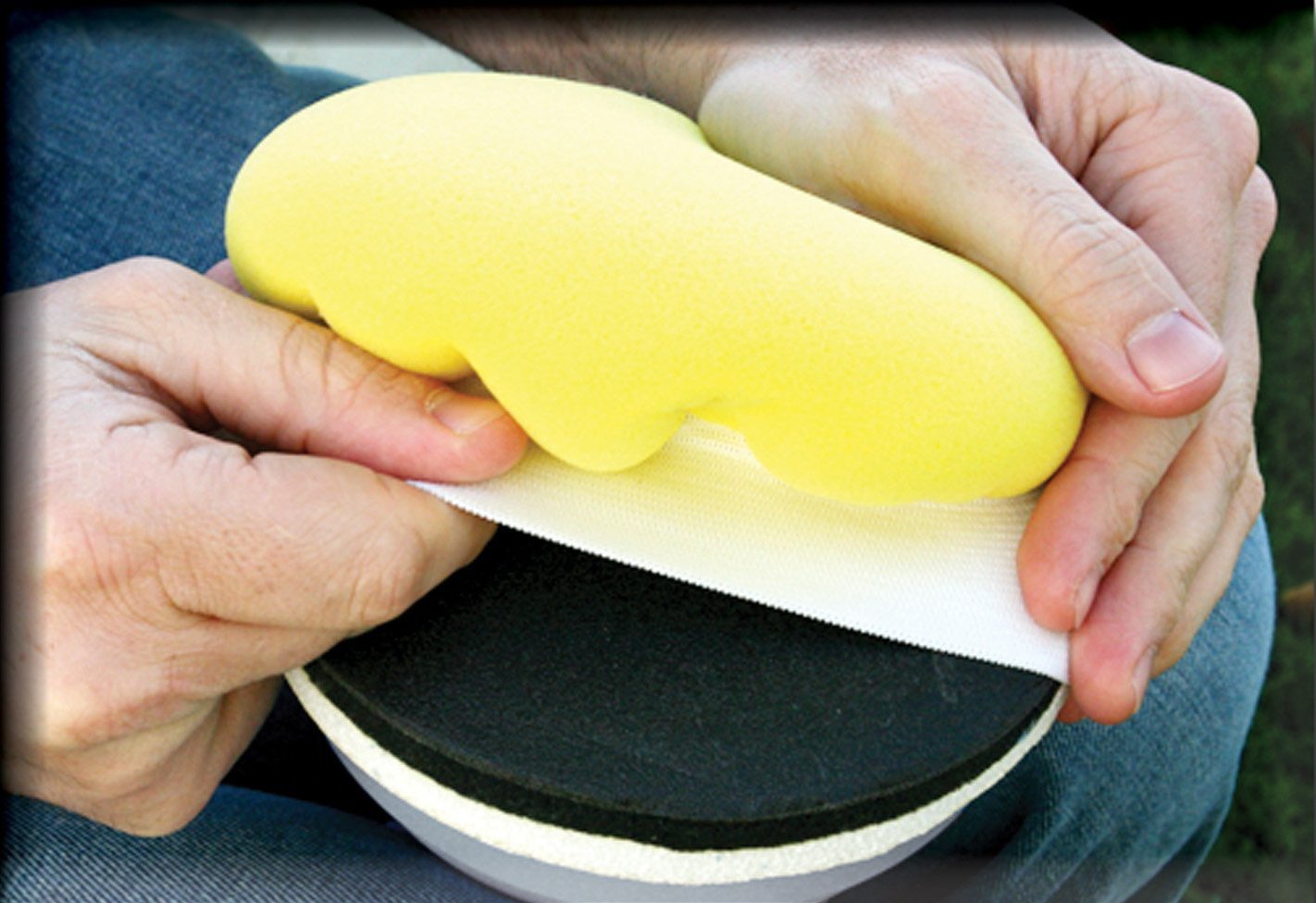 Carrand AutoSpa foam bonnet with elastic edge showing secure fit during use