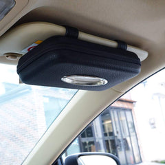 Cartisen tissue holder on sun visor clip for quick reach during drives.