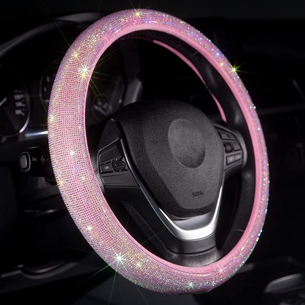 Carwales pink bling steering wheel cover with rhinestones adds feminine style and grip.