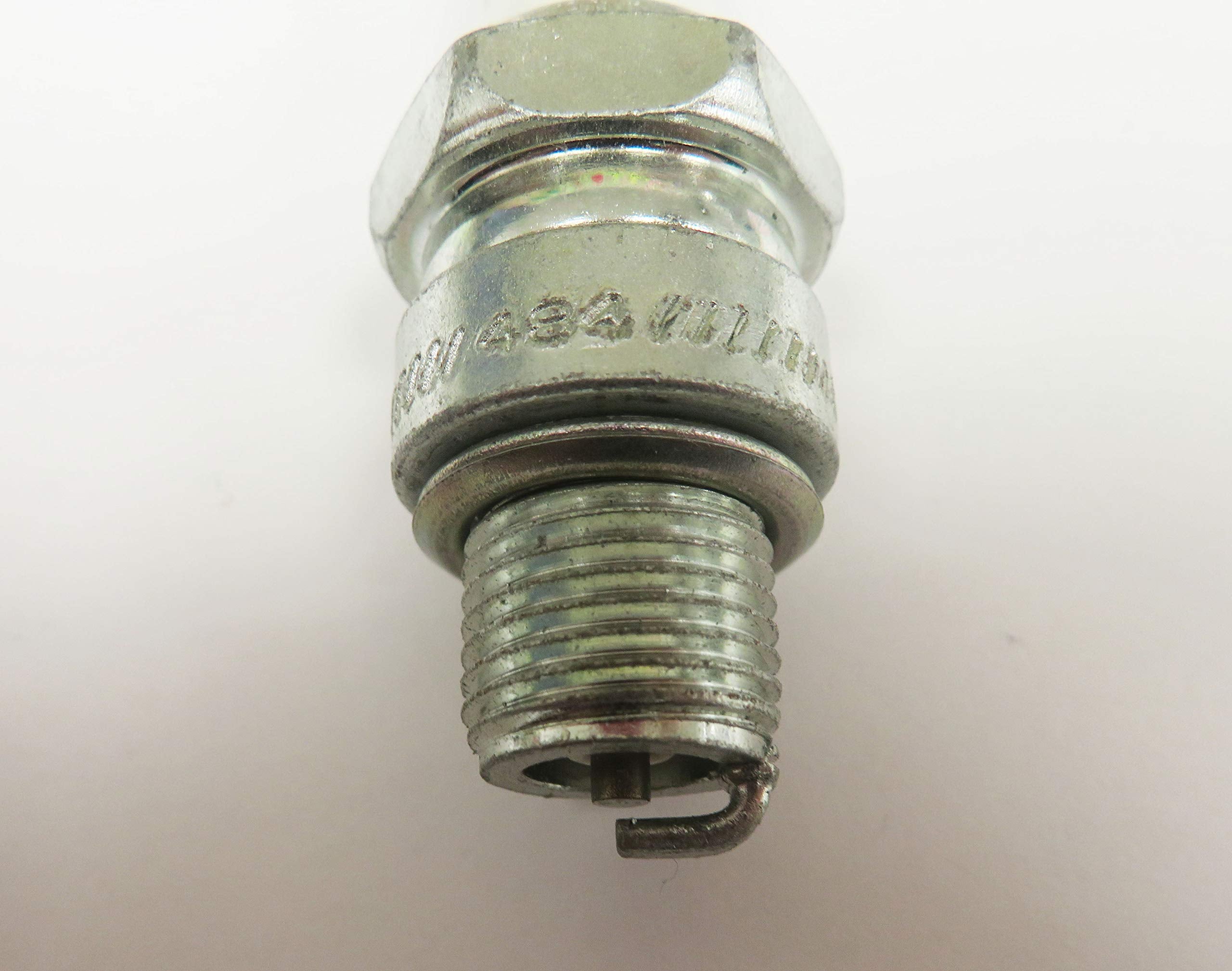 Champion Copper Marine Spark Plug 828M installed for smooth startup.