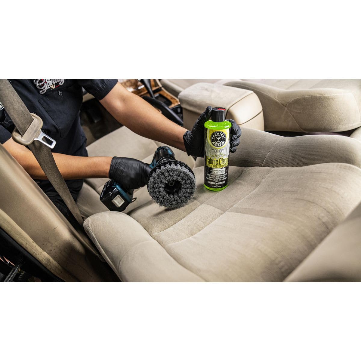 Spinner brush in car interior, reaching seats and fabrics with ease.