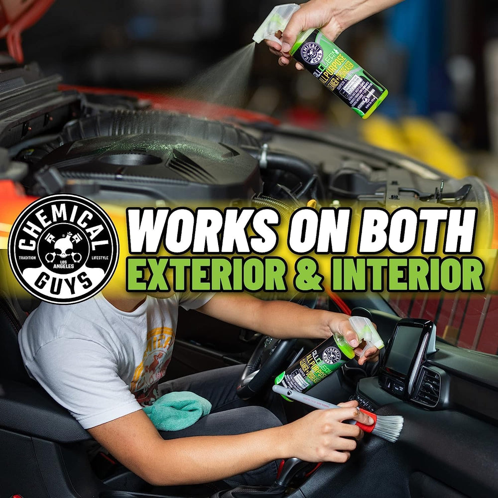 Applying Chemical Guys All Clean+ Citrus spray to dashboard for quick interior cleaning