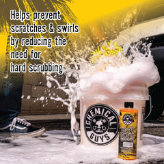 Tar stain softening on painted surface with Chemical Guys Bug & Tar Remover.