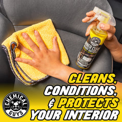 Chemical Guys InnerClean spray action on a dusty dash for fast cleaning.