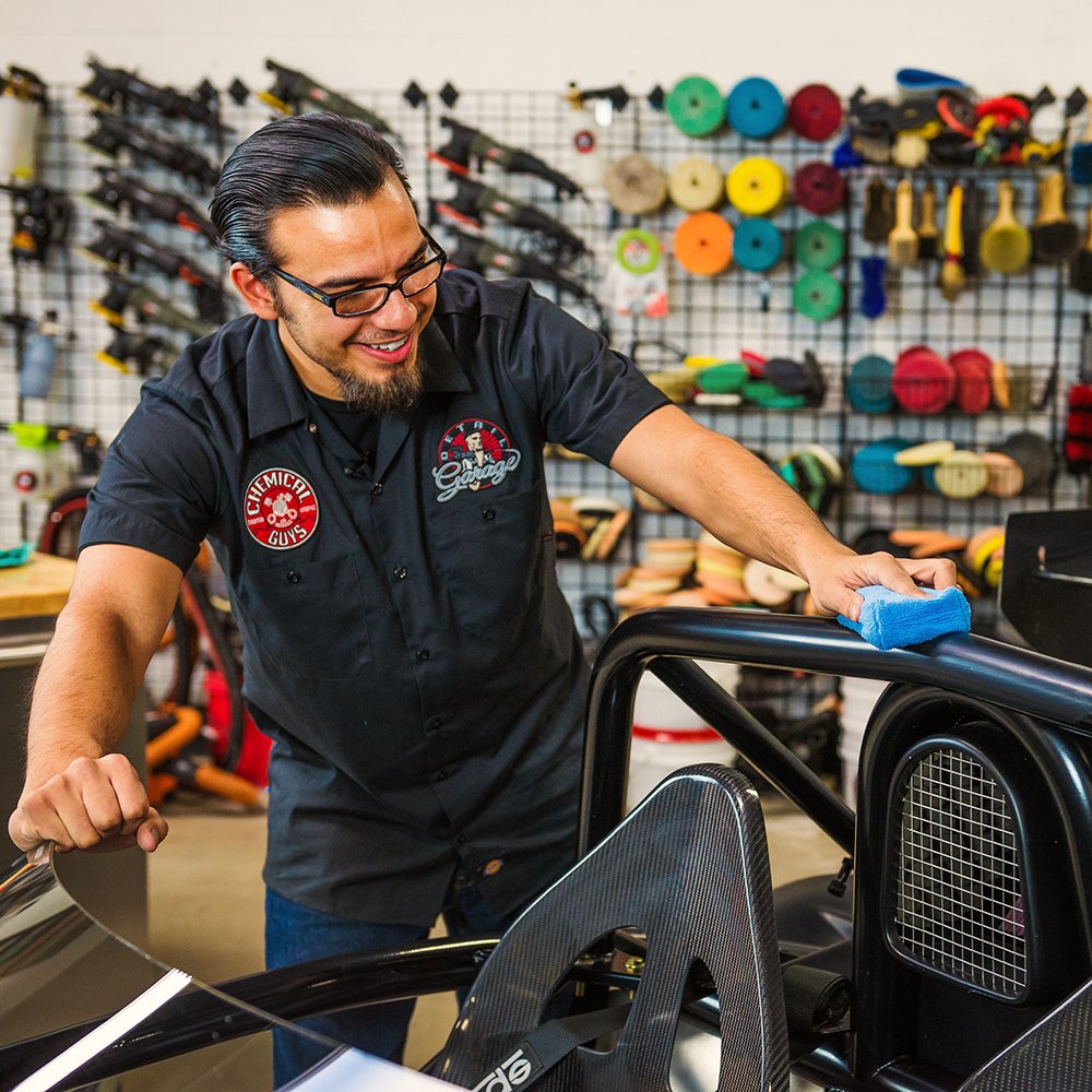 Chemical Guys microfiber pad used for tire dressing with controlled, precise results.