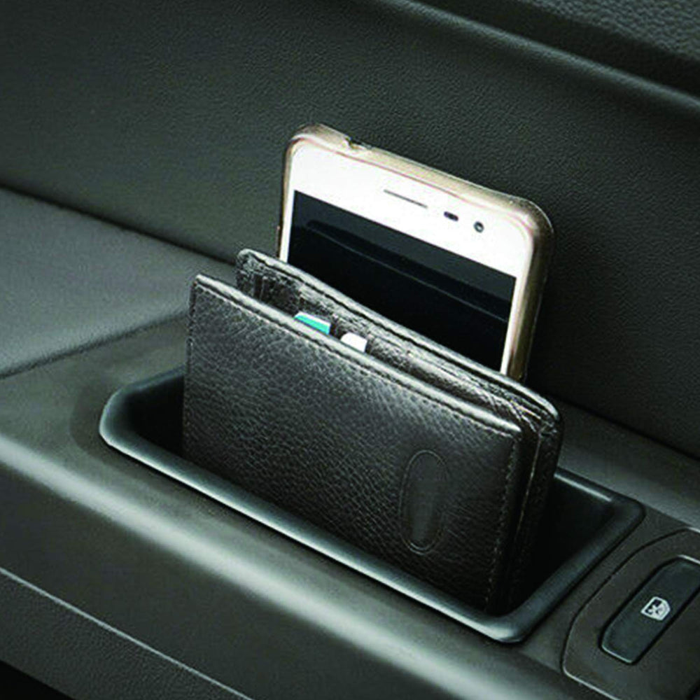 Citumo armrest storage front-right enables quick access and tidy cupholders.