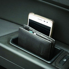 Citumo armrest storage front-right enables quick access and tidy cupholders.