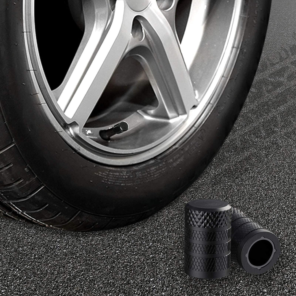 CKAuto caps on parked car wheel in driveway offering a neat, finished look