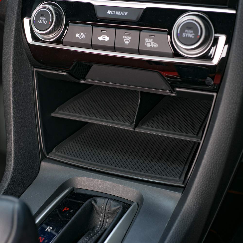CKE armrest organizer tray enhances cabin organization without interfering with seating.