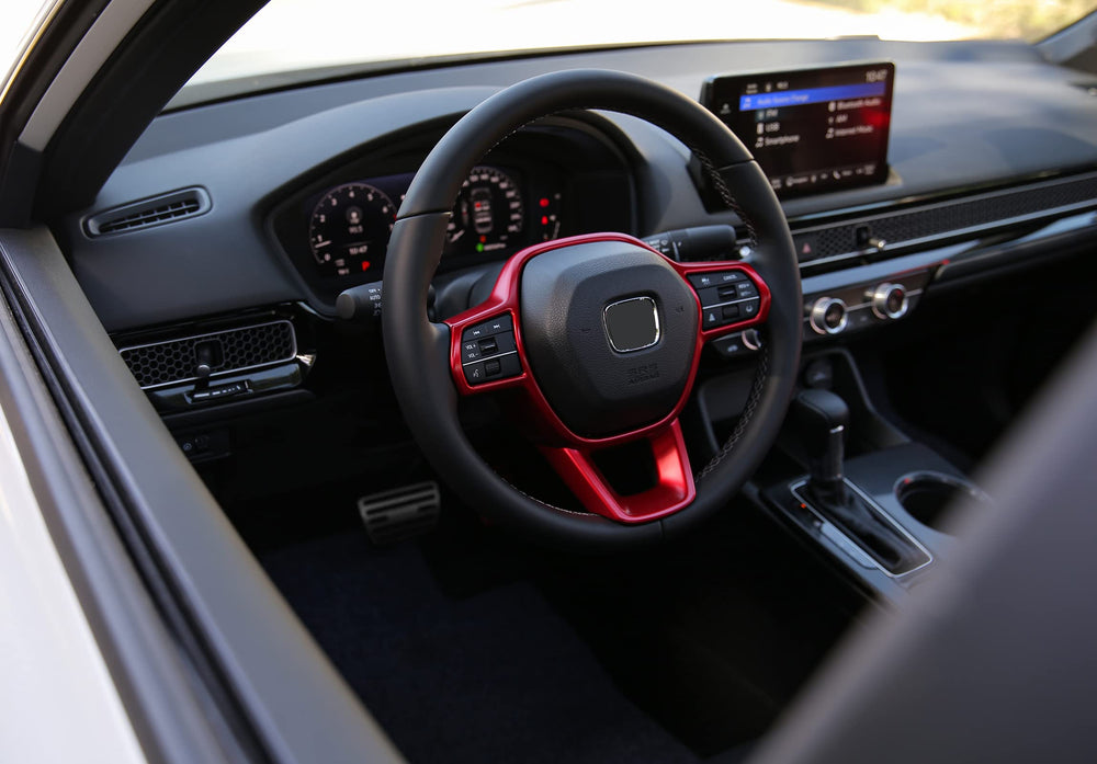 CKE CR-V center console cover in red guards wear from daily use.